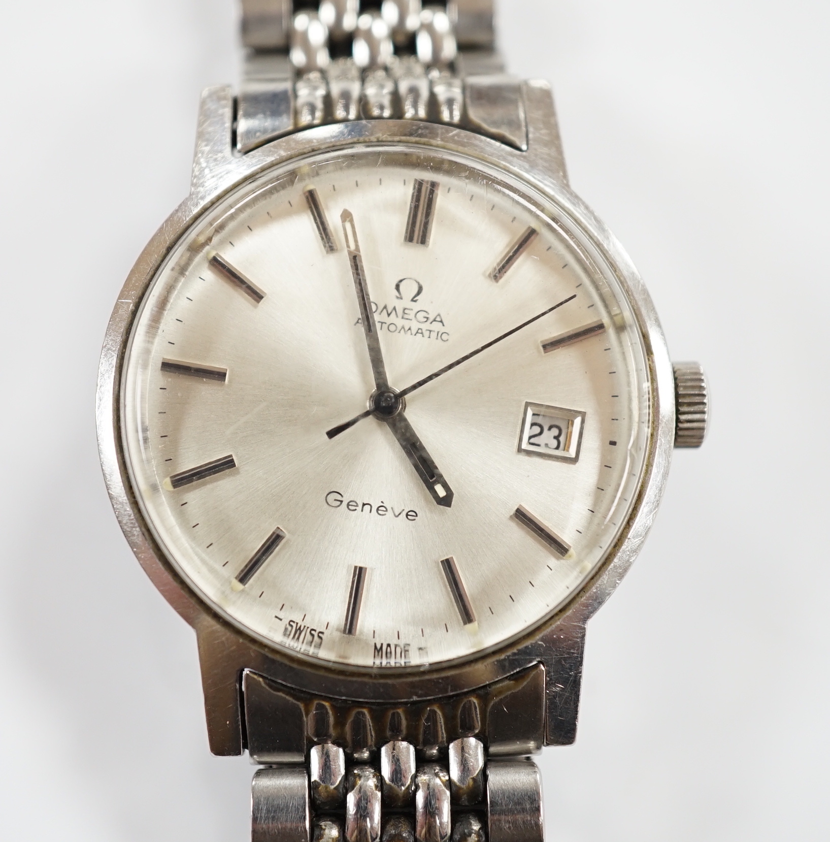 A gentleman's early 1970's stainless steel Omega automatic wrist watch, with date aperture, on a stainless steel Omega bracelet, with Omega box, no papers.